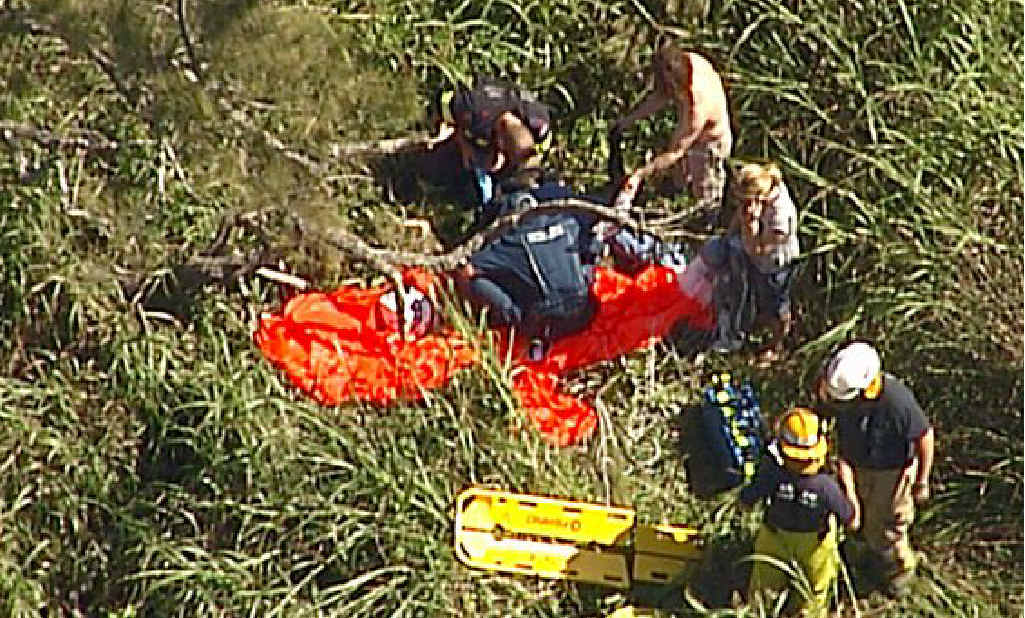 Emergency crews attend to a man who was injured while skydiving at the weekend. Emergency crews attend to a man who was injured while skydiving at the weekend.